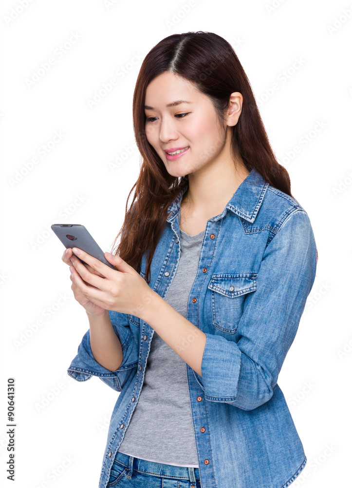 Asian young woman read on the mobile phone Asian young woman read on the mobile phone