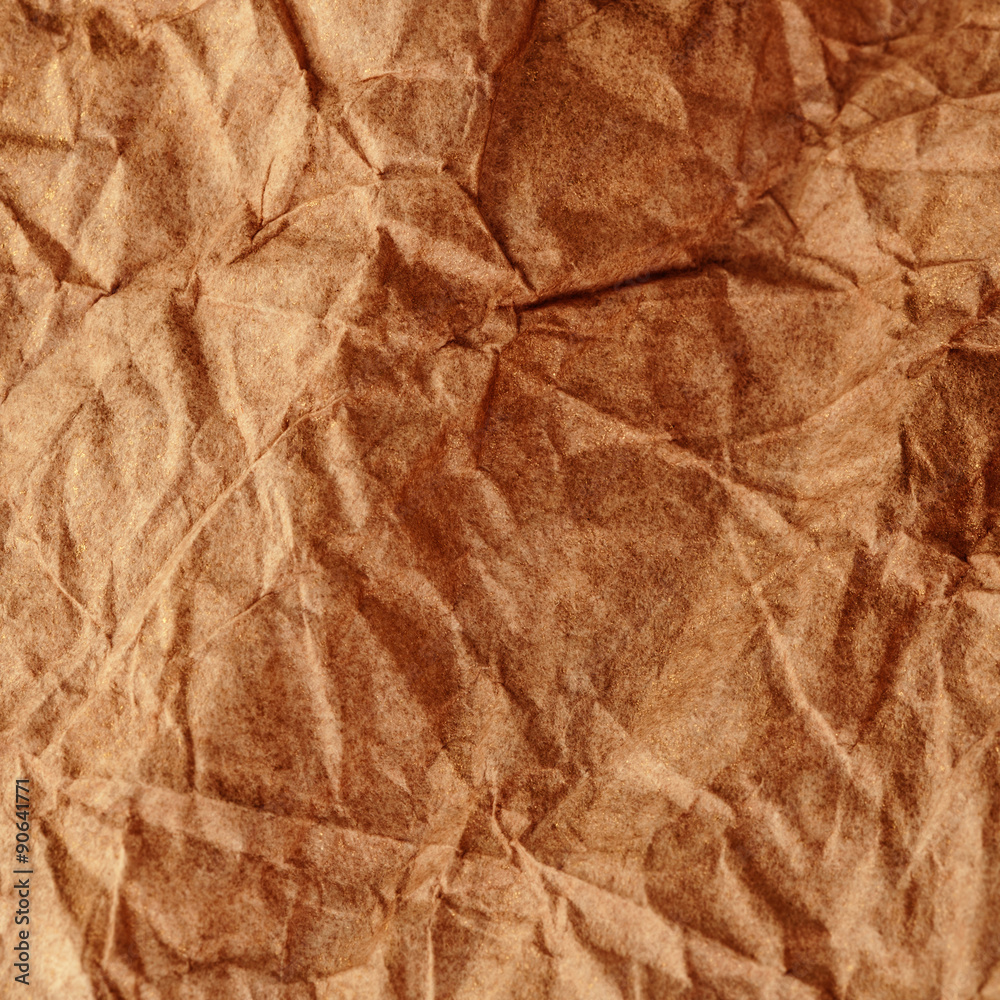 Fototapeta premium Crumpled recycled paper background texture. Vintage craft paper