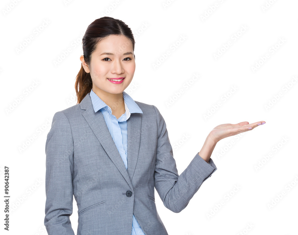 Young businesswoman with open hand palm Young businesswoman with open hand palm