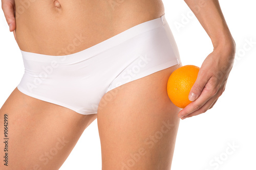 orange skin / Woman with an orange in his hand