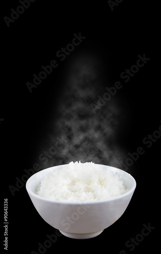 Isolated of Hot Steamed Rice in a White Bowl on dark background