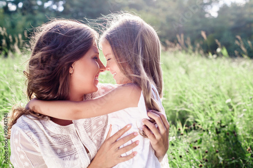 Happy Family outdoor. Mother and daughter