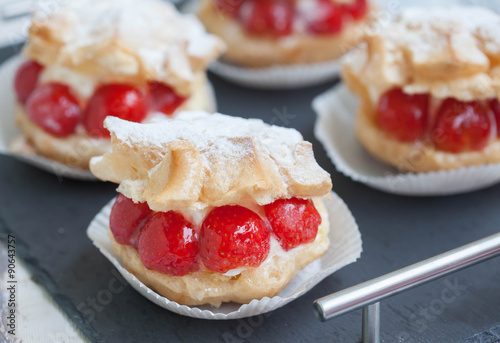 Cream Puffs with strawberries  selective focus