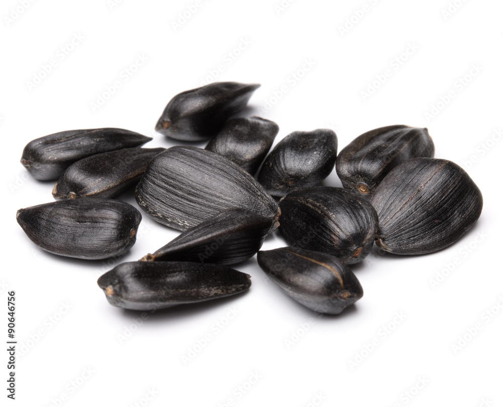 Sunflower seeds isolated on white background close up Sunflower seeds isolated on white background close up
