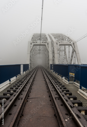 Superstructure of railway steel truss bridge in Krakow, Poland, over Vistula river #90648333