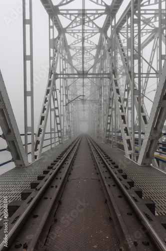 Superstructure of railway steel truss bridge in Krakow, Poland, over Vistula river #90648345