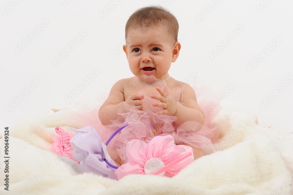 Cute and happy newborn baby playing, smiling, laughing, looking isolated white background Cute and happy newborn baby playing, smiling, laughing, looking isolated white background