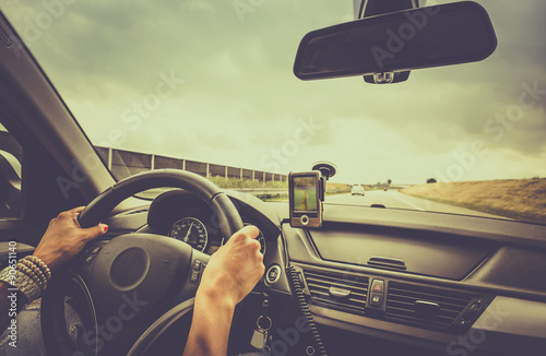 Woman driving a car photo