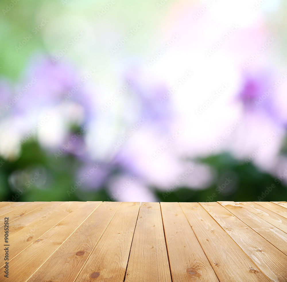 Wooden table with abstract blur background Wooden table with abstract blur background