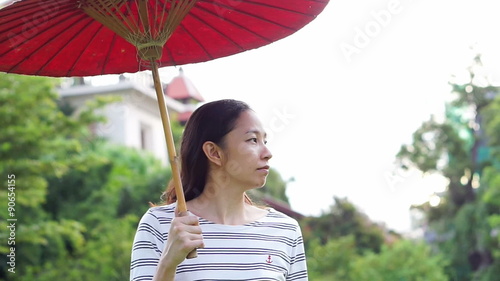 oriental red umbrella with asian girl photo