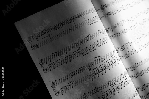 Music sheets in the shadow,...