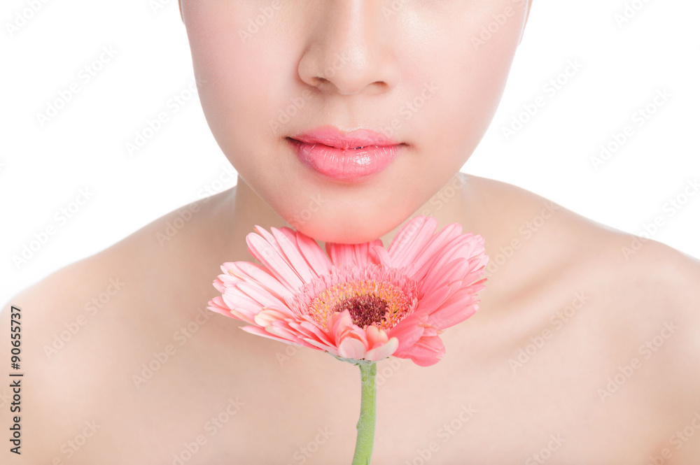 beautiful young woman and pink gerbera beautiful young woman and pink gerbera