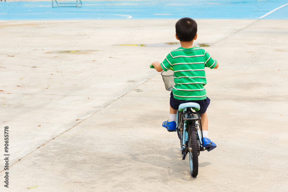 Fototapeta premium Boy rid bicycle