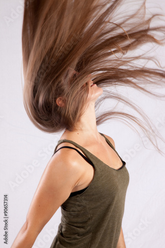 Pretty woman slinging her hair