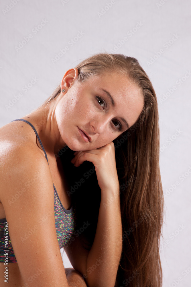 Pretty long haired woman looking thoughtful Pretty long haired woman looking thoughtful