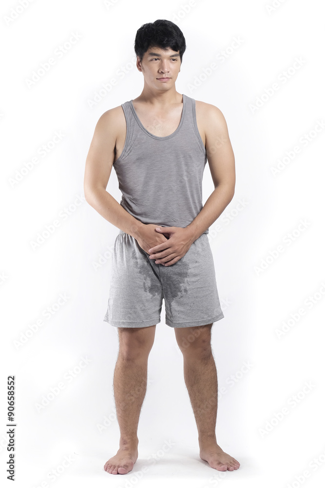 Asian man in grey pajamas with wet crotch Asian man in grey pajamas with wet crotch