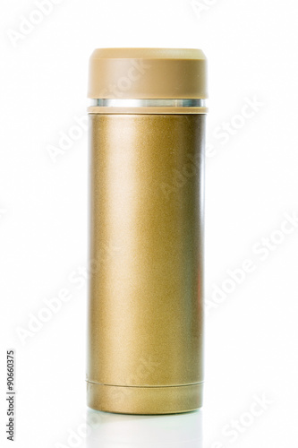 Gold metal thermos isolated on white background