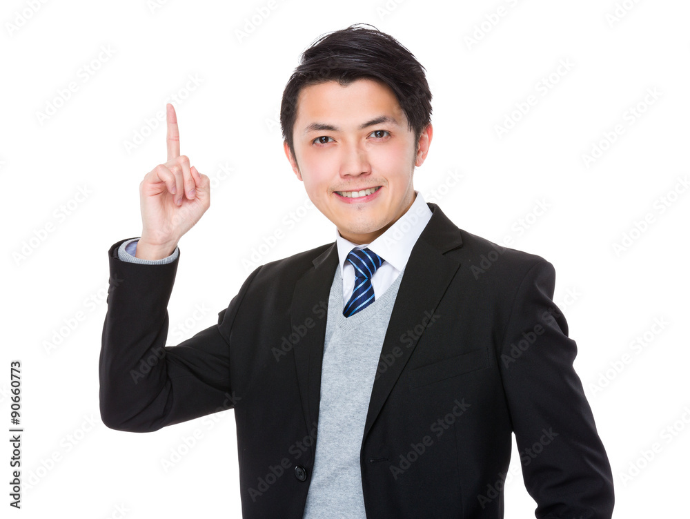 Asian young businessman with finger point up Asian young businessman with finger point up