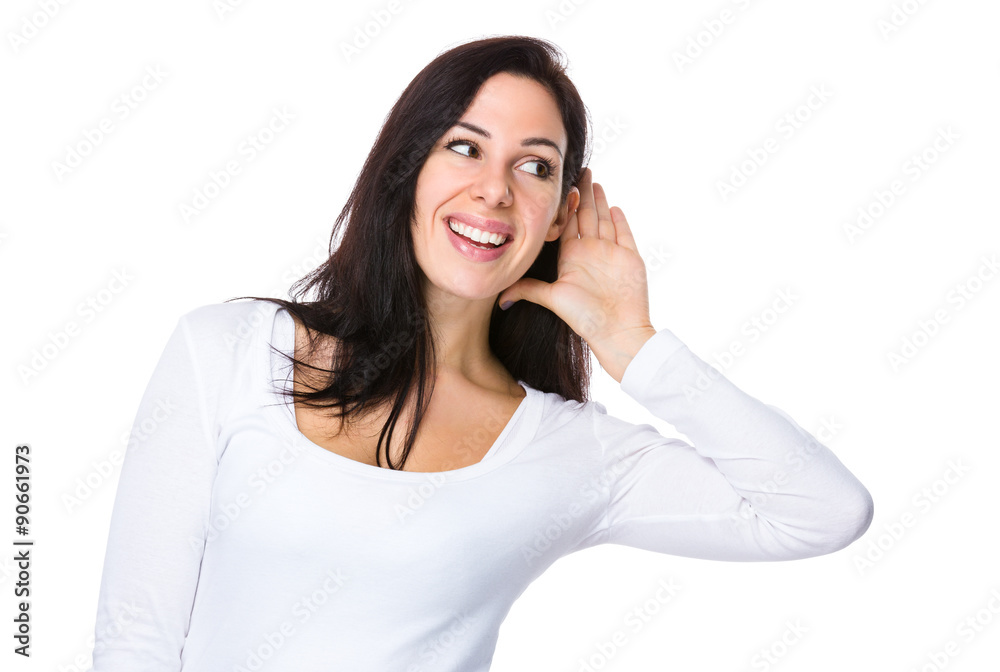 Woman gossip about other with hand near her ear Woman gossip about other with hand near her ear