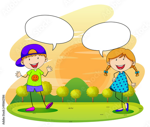 Boy and girl talking in the park