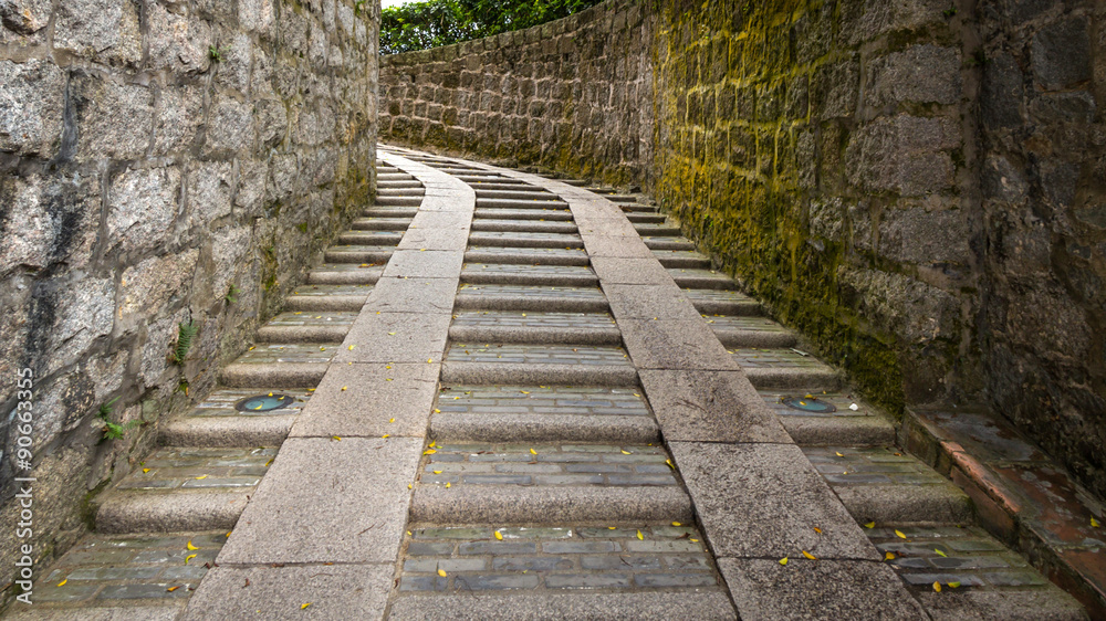 A outdoor staircase of ancient Monte Fort in Macau, China A outdoor staircase of ancient Monte Fort in Macau, China
