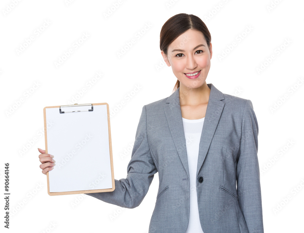 Asian businesswoman show with the clipboard Asian businesswoman show with the clipboard