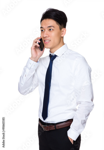 Asian young businessman talk to cellphone