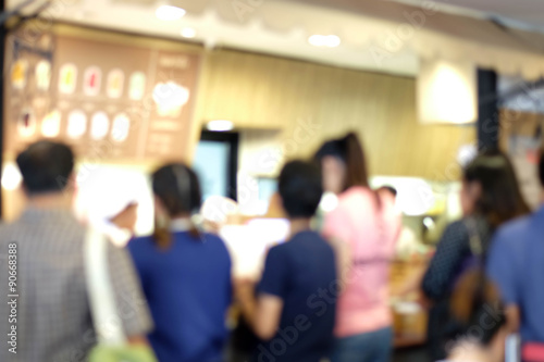 People shopping in milk shop in department store. © dadatop