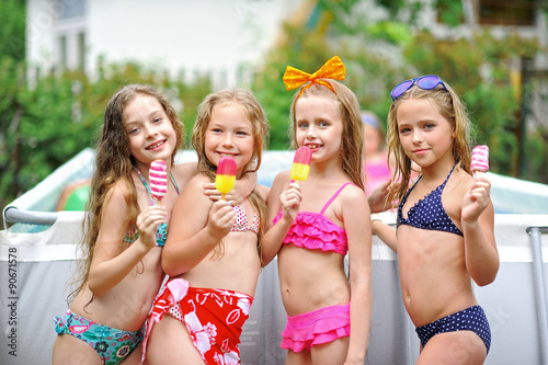 Portrait of children on the pool in summer