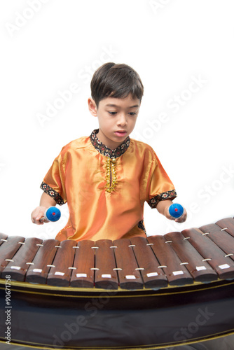 Little boy learning Thai instument Xylophone, Ranat,