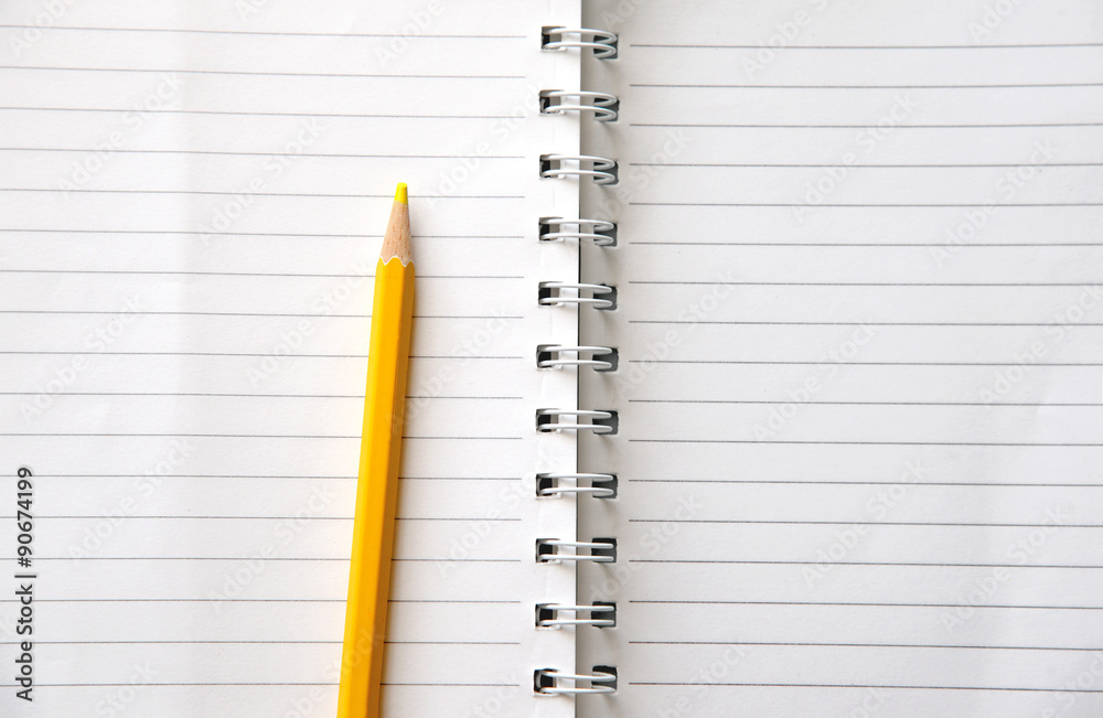 yellow colored pencil on white stripe pattern blank book yellow colored pencil on white stripe pattern blank book