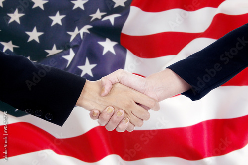 Handshake over american flag background