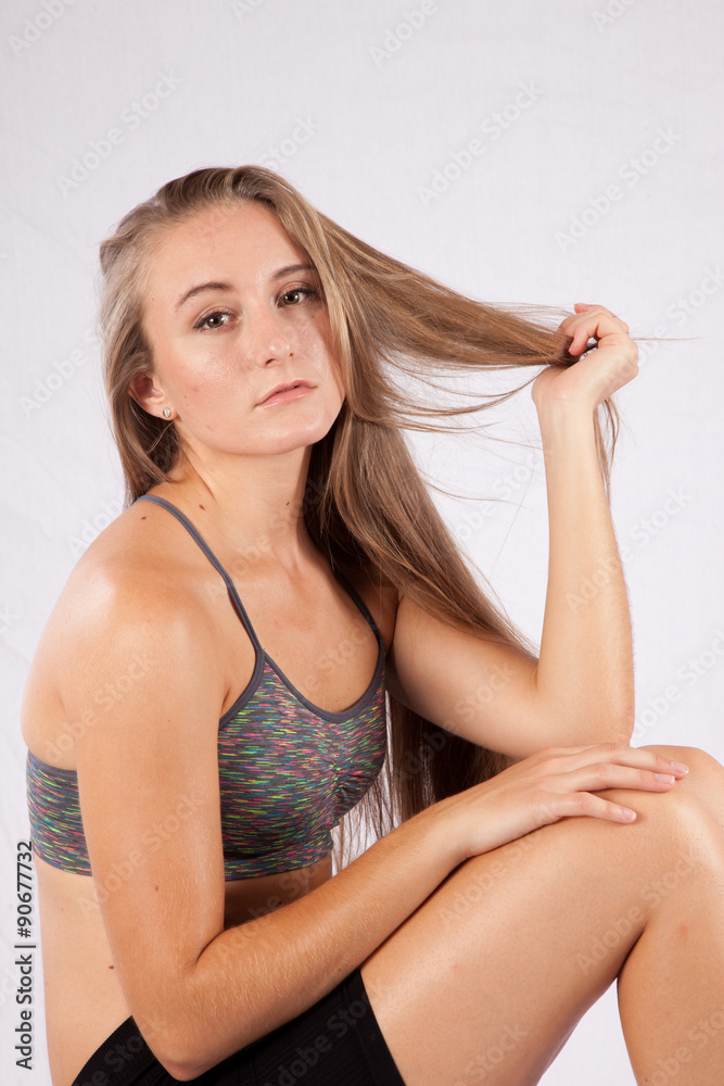 Fototapeta premium Pretty long haired Caucasian woman, sitting thoughtfully