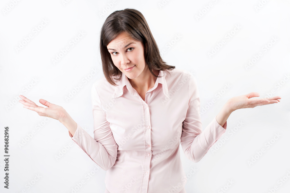 Beautiful businesswoman gesturing with uncertainty. Beautiful businesswoman gesturing with uncertainty.