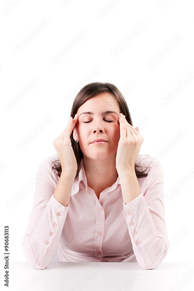 A businesswoman with a headache holding head, isolated on white background.