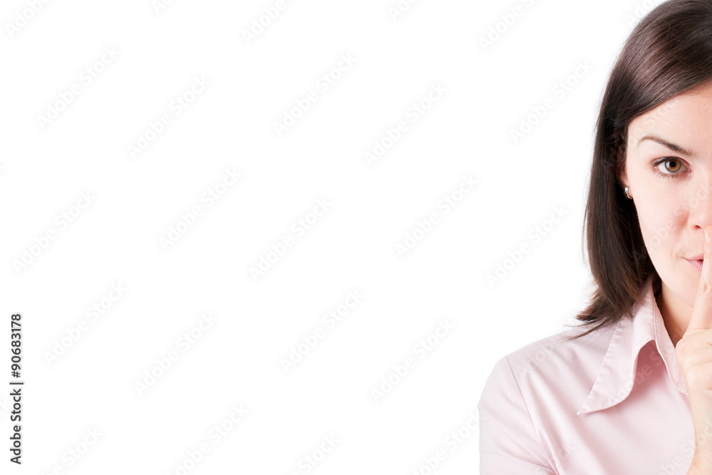 Young business woman making silence gesture isolated over white Young business woman making silence gesture isolated over white