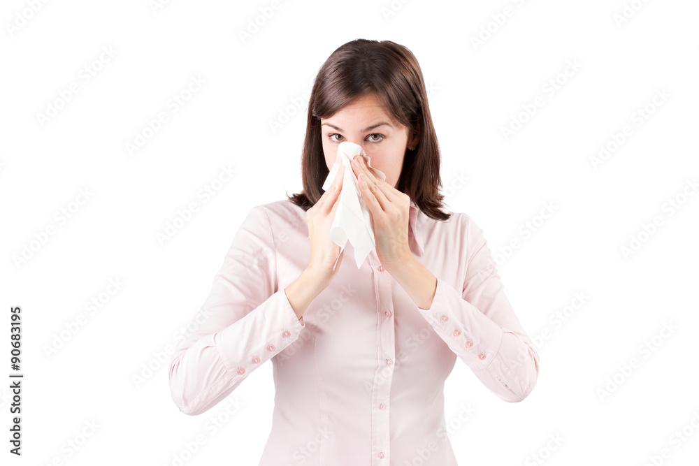 Beautiful young business woman with a cold blowing nose. Beautiful young business woman with a cold blowing nose.