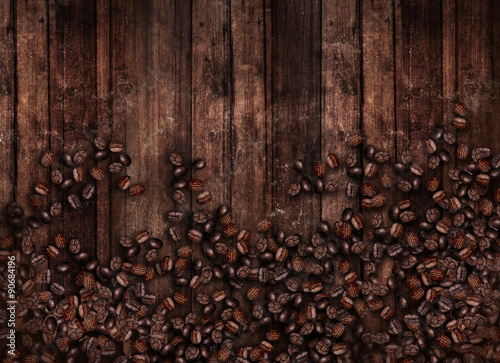 Coffee beans on old wooden 