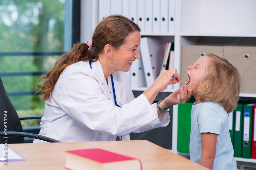 female pediatrician in white lab coat examined little patient female pediatrician in white lab coat examined little patient