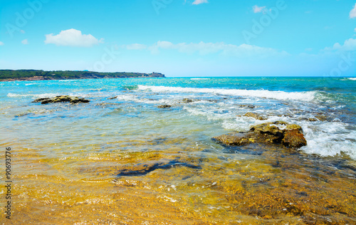 rocks and sand in Porto Ferro