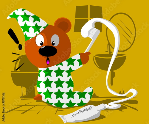 Bear in pajamas is spreading toothpaste
