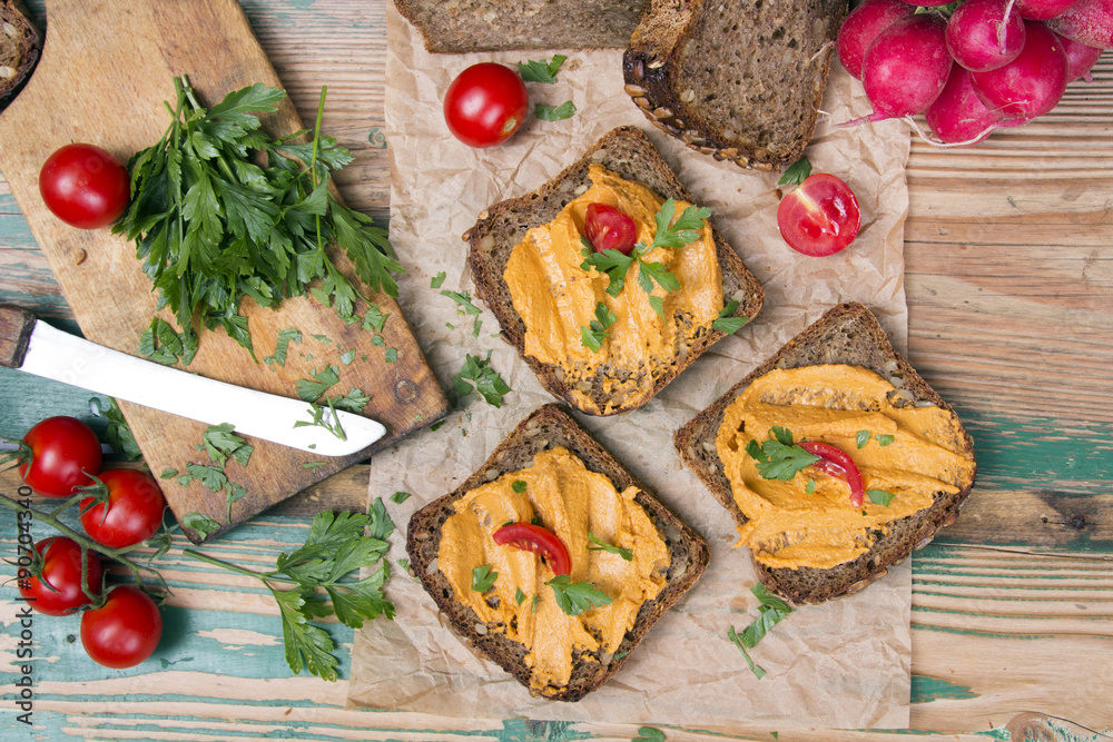 sandwich with tomato pate and chopped parsley - delicious breakfast