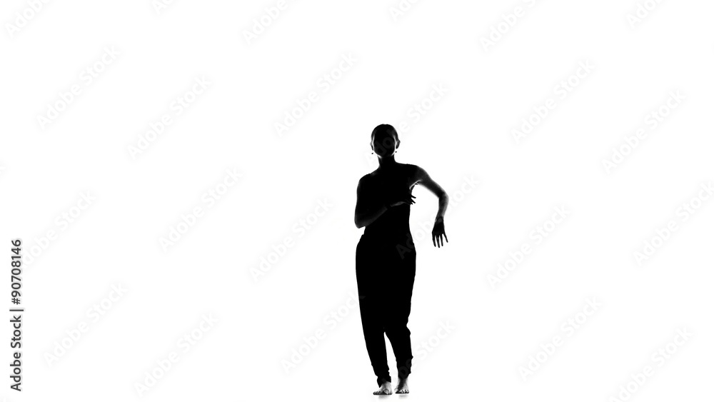 Young social latina dancer continue dancing, barefoot, on white Young social latina dancer continue dancing, barefoot, on white