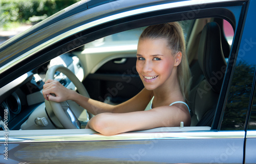 young girl in car