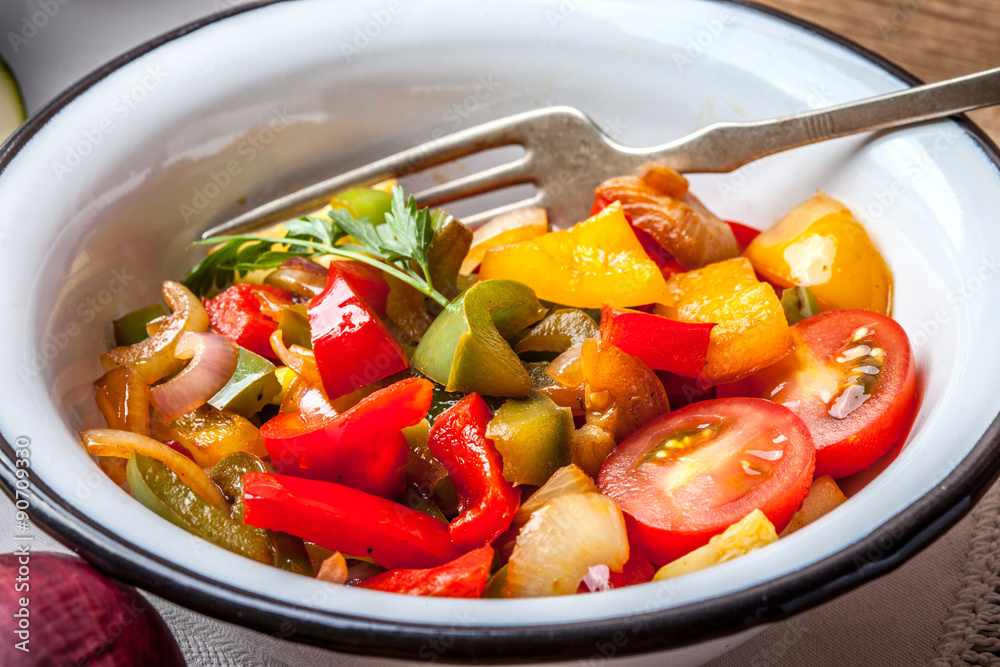 Ratatouille on a rustic table. Ratatouille on a rustic table.