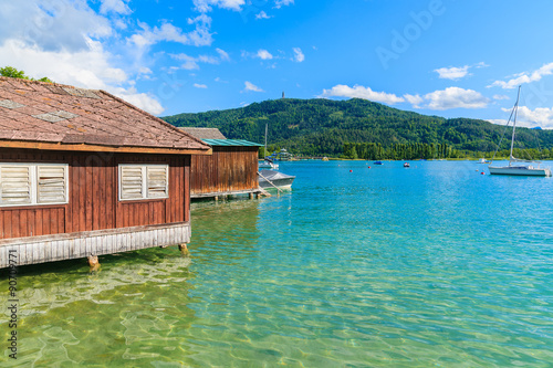 Wooden traditional boat house on shore of Worthersee lake in summer, Austria