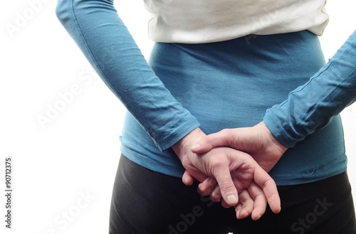 Girl hands behind his back