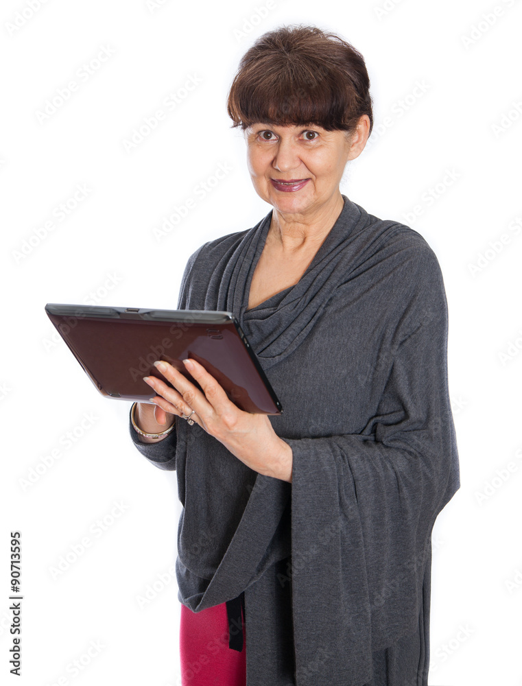 Pension age good looking woman searching in the internet Pension age good looking woman searching in the internet