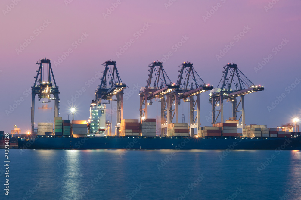 Container Cargo freight ship with working at dusk for Import Exp