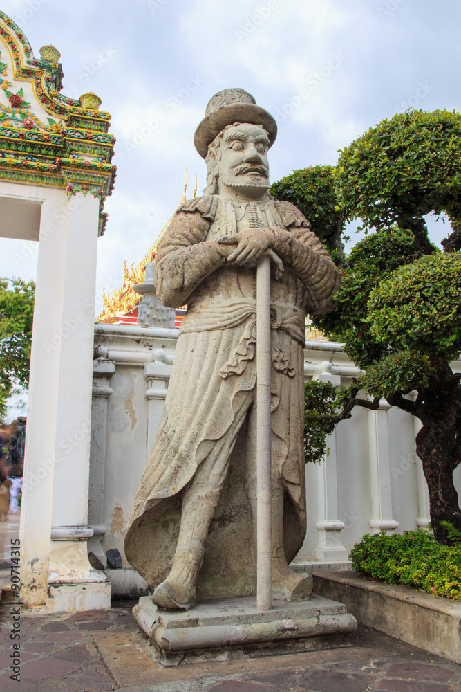 Obraz premium European giant statue at Wat Pho temple, Bangkok, Thailand